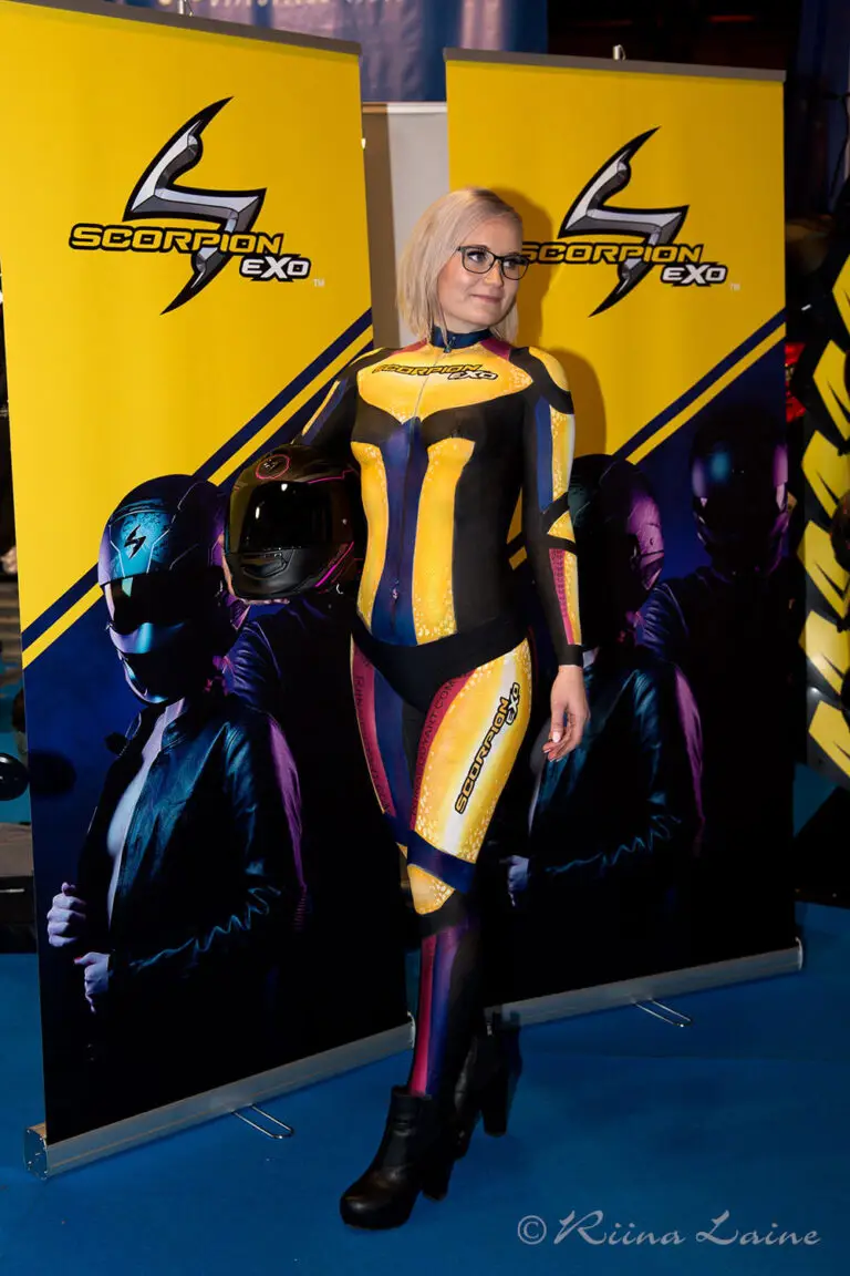 Promo body painting by Riina Laine . Motorcycle trade show. Scorpion Exo.