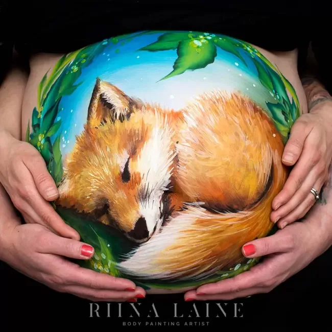 Amazing belly art by Riina Laine